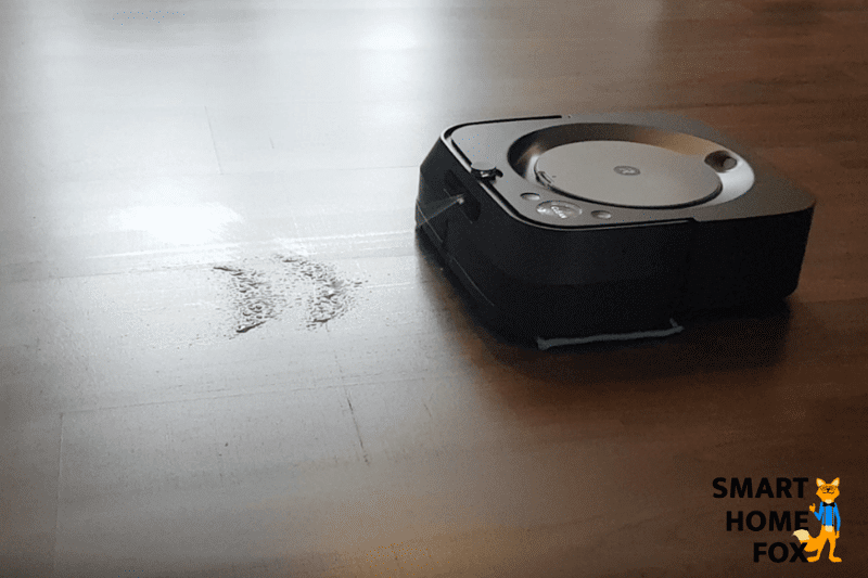 The iRobot Braava Jet M6 robot mop cleans the floor.